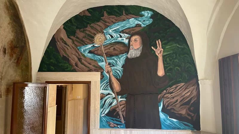 Il popolo coriglianese omaggia San Francesco di Paola con un affresco che richiama il “Miracolo dell’Acqua"
